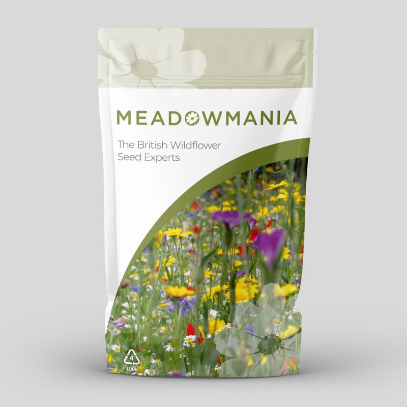 Meadowmania seed packaging, with the branding and a photograph of some colourful wildflowers visible on the front