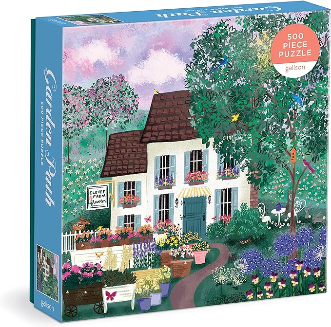 Box of Garden Path 500 piece jigsaw puzzle, showing illustration of a cottage surrounded by flowers